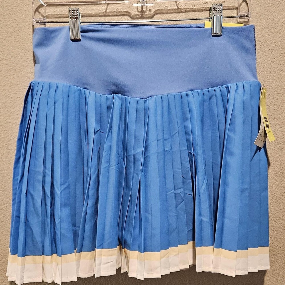 All in Motion M blue pleated skort with white trim
